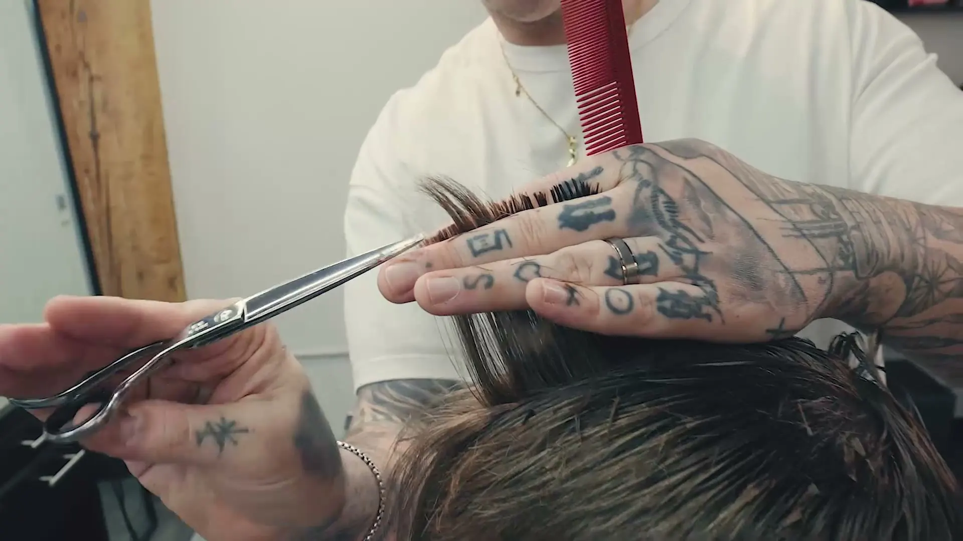 Studio AZ Barbershop — scissor cut in progress, North Loop Minneapolis